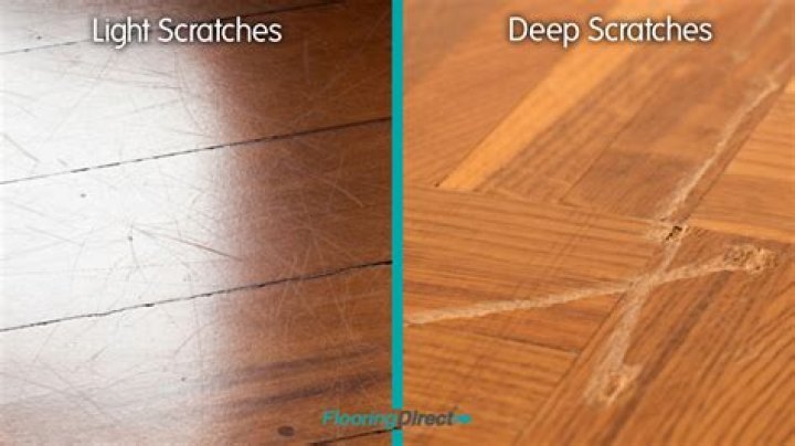 Can buffing a wood floor remove scratches?