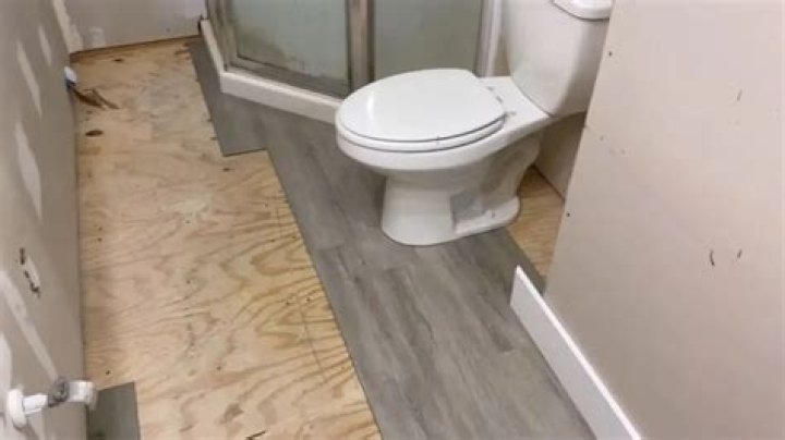 Do you put vinyl flooring under toilet?