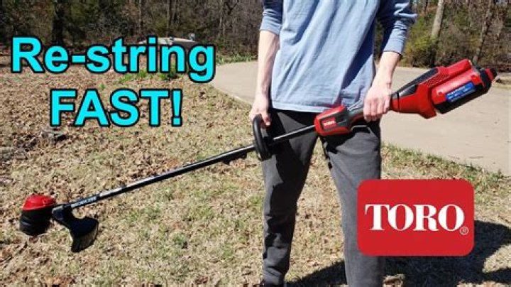 How do you change the spool on a Toro electric trimmer?