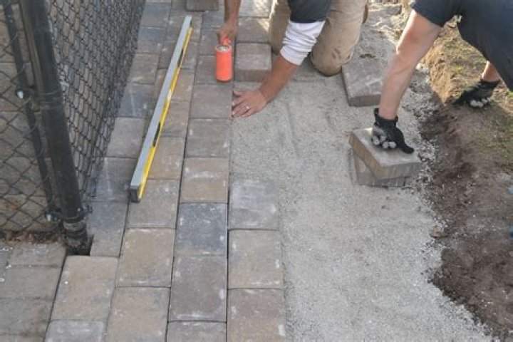 How do you clean landscaping pavers?
