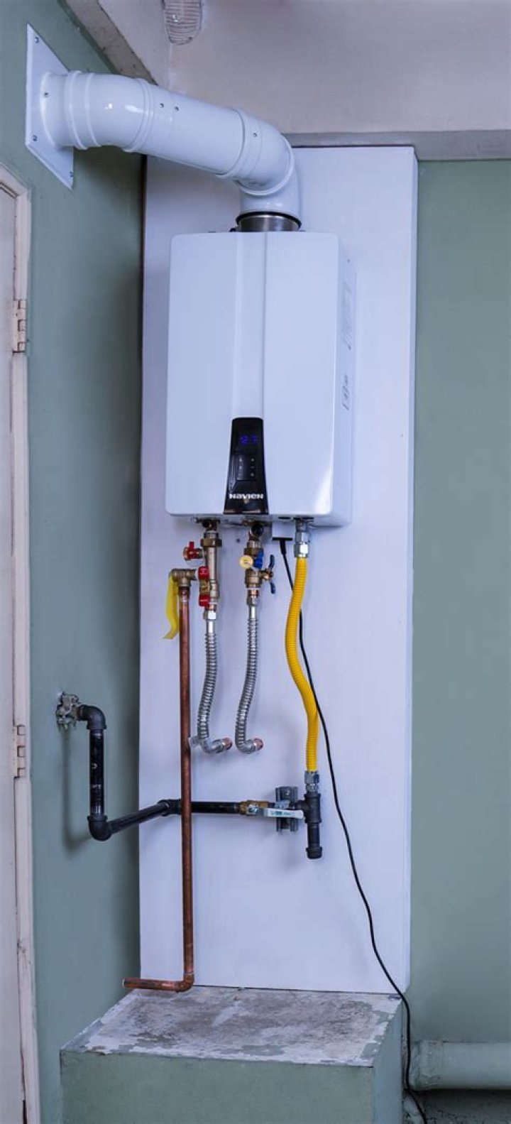 How does a tankless water heater function?