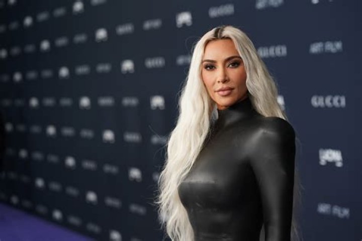 Kim Kardashian’s Boobs Look Uncomfortable in This Jumpsuit — Plus 10 Other “Onesies” Gone Terribly Wrong