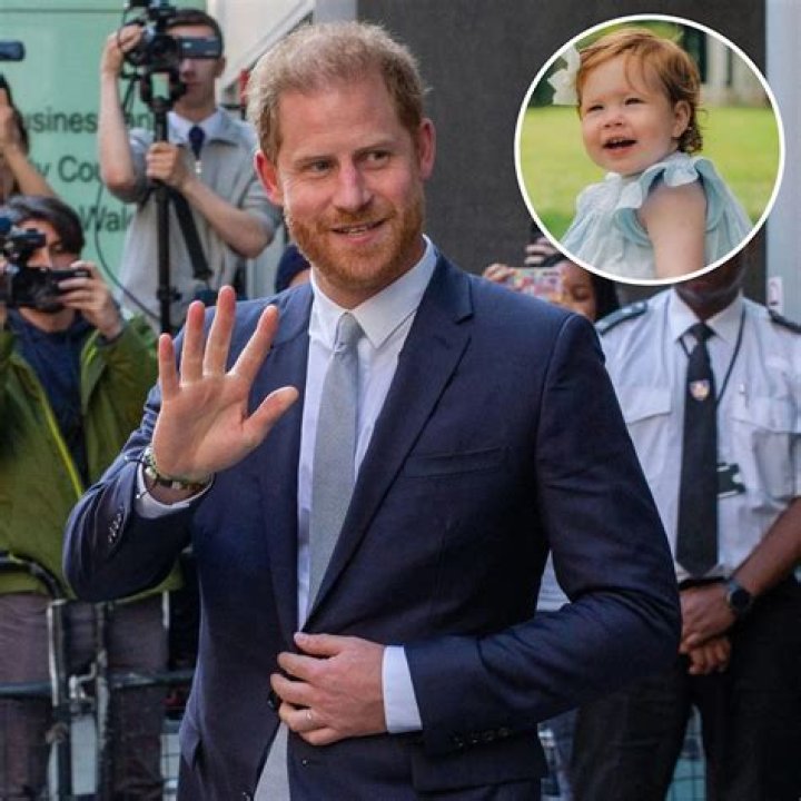 Princess Lilibet Held in Prince Harry’s Arms in Rare New Photo From 4th of July Parade