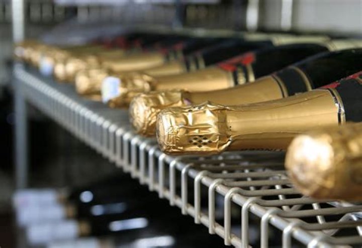 Should champagne be stored cold?