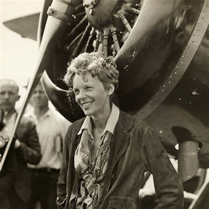 Was amelia earhart the first woman to fly a plane?