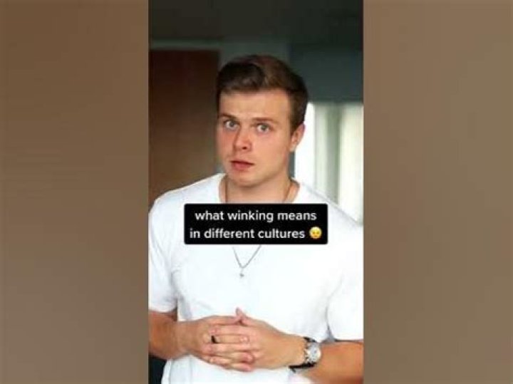 What winking means in different cultures?